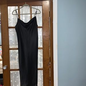Black satin slip dress with cowl neck